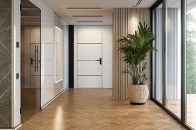 Ingresso moderno con porta blindata bianca