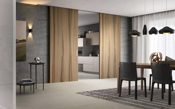 Porte in stile contemporaneo. Porte scorrevoli a tutta altezza, collezione Scenario Lignum due ante. Azienda FerreroLegno S.p.A.